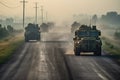 a convoy of military vehicles driving down a road