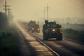 a convoy of military vehicles driving down a road