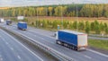 Convoy of trucks moving along the highway Royalty Free Stock Photo