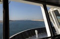 Convoy of vessels transiting through the Suez Canal, North bound, approaching Egyptian-Japanese Friendship bridge