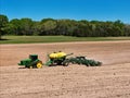 John Deere 8420T tractor pulling a Deere 1910 air cart with a 68 row Deere 1890 air seeder planting soybeans Royalty Free Stock Photo