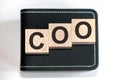 COO - acronym from wooden blocks with letters, concept. COO - chief operating officer