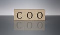 COO concept, wooden word block on the grey background Royalty Free Stock Photo
