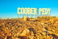 Coober Pedy wellcome sign at sunset Royalty Free Stock Photo