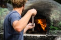 Cook baking pizza Royalty Free Stock Photo