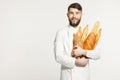 cook with bread and baguettes Royalty Free Stock Photo