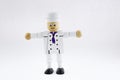 Cook chef. wooden toy cook chef figure. isolated cook chef