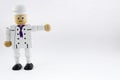 Cook chef. wooden toy cook chef figure. isolated cook chef