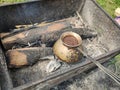 Cook coffee on the coals in nature Royalty Free Stock Photo