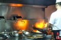 The cook in the crowded kitchen work Royalty Free Stock Photo