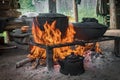 Cook food on burning campfire. Cooking on an open fire. Outdoor