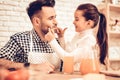 Cook Food at Home. Father Feeds Daughter. Pour Juice into Glass. Hhappy Family. Father`s Day. Girl and Man Cook Food. Man and Royalty Free Stock Photo