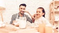 Happy Girl Dabbles with Father with Flour on Face. Royalty Free Stock Photo