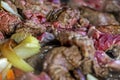 cook fresh meat cut into pieces in a frying pan with vegetables, top view. Royalty Free Stock Photo