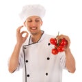 Cook with fresh tomatoes Royalty Free Stock Photo