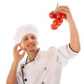 Cook with fresh tomatoes Royalty Free Stock Photo