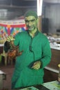 A cook holds a delicious tandoori chicken during the ramadan feast in India Royalty Free Stock Photo