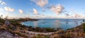 In the morning the fabulous view from the top of Island on the beautiful blue bay. A white ship in the bay Royalty Free Stock Photo