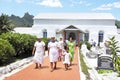 Cook Islanders exit from Ekalesia Matavera CICC church in Rarotonga, Cook Islands