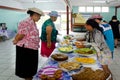 Cook Islands woman serve traditional food on sunday morning tea