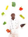 Cook Juggling With Vegetables Royalty Free Stock Photo