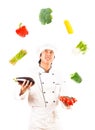 Cook Juggling With Vegetables Royalty Free Stock Photo