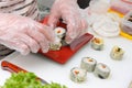 Cook in the kitchen serving japan susi on plate Royalty Free Stock Photo