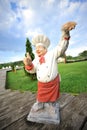 A cook made in ceramic in a garden Royalty Free Stock Photo
