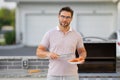 Cook man preparing barbecue grill outdoor. Man cooking tasty food on barbecue grill at backyard. Chef preparing food on Royalty Free Stock Photo