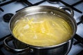 Cook pasta in boiling water. Place for your text Royalty Free Stock Photo