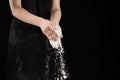 Cook pouring wheat white flour, hands close-up, copy place for text. Royalty Free Stock Photo