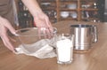 Homemade cakes. The cook prepares the ingredients for making a pie.