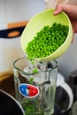 Cook preparing green puree