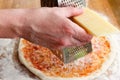 Cook preparing pizza Royalty Free Stock Photo