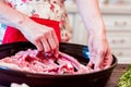 Cook puts raw lamb ribs on frying pan close up Royalty Free Stock Photo