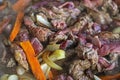 cook raw fresh meat cut into pieces in a frying pan with vegetables, Royalty Free Stock Photo