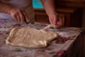 Cook's hands kneading dough for cakes. Preparing the flour for leavening Royalty Free Stock Photo