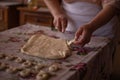 Cook's hands kneading dough for cakes. Preparing the flour for leavening Royalty Free Stock Photo