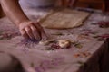 Cook's hands kneading dough for cakes. Preparing the flour for leavening Royalty Free Stock Photo