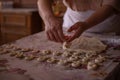 Cook\'s hands kneading dough for cakes. Preparing the flour for leavening Royalty Free Stock Photo