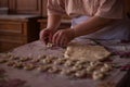 Cook\'s hands kneading dough for cakes. Preparing the flour for leavening Royalty Free Stock Photo