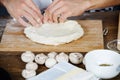 Cook sculpt pizza dough