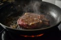 cook searing sousvide finished steak on a hot skillet for a crust