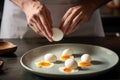 a cook, seasoning a plate of perfectly cooked eggs, ready to be savored