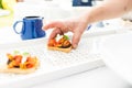 Cook serving vegetarian canapes Royalty Free Stock Photo