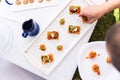 Cook serving vegetarian canapes Royalty Free Stock Photo