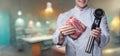 Cook shows vacuum-packed meat with a device for cooking at low temperature Royalty Free Stock Photo