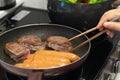 Cook steak and sausage in a frying pan