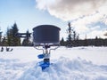 Cook at an winter outdoor campsite. Outdoor cooking in winter