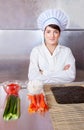 Cook woman with ingredients for sushi rolls Royalty Free Stock Photo